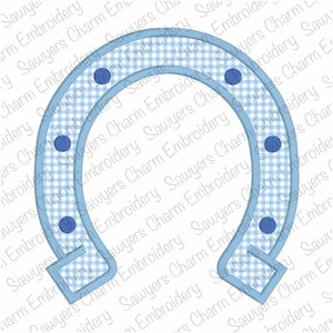 May include: A blue and white gingham horseshoe with blue polka dots. The horseshoe is outlined in blue.