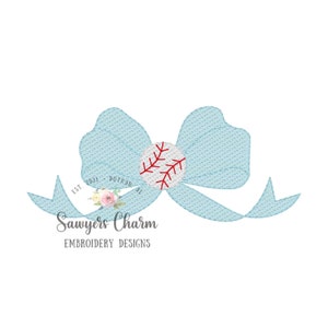 May include: A light blue bow with a red and white baseball in the center. The bow is embroidered with the text "Sawyers Charm Embroidery Designs" and "EST. 2021 - DOTHAN, AL".