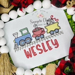 Kerst stoommachine trein, warme chocolademelk, believe ticket, jingle bell schetssteek machine borduurwerk ontwerpbestand, fijne feestdagen