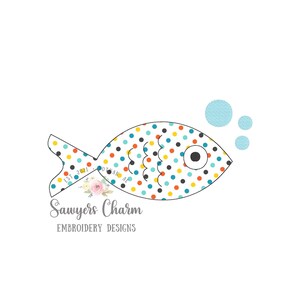 May include: A colourful fish with black, yellow, orange and blue polka dots. The fish has a black eye and is surrounded by three blue bubbles. The text "Sawyers Charm Embroidery Designs" is below the fish.