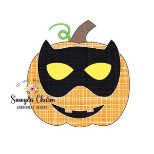 May include: Orange pumpkin with a black eye mask and a jack-o'-lantern face. The pumpkin has a plaid pattern and a green stem.