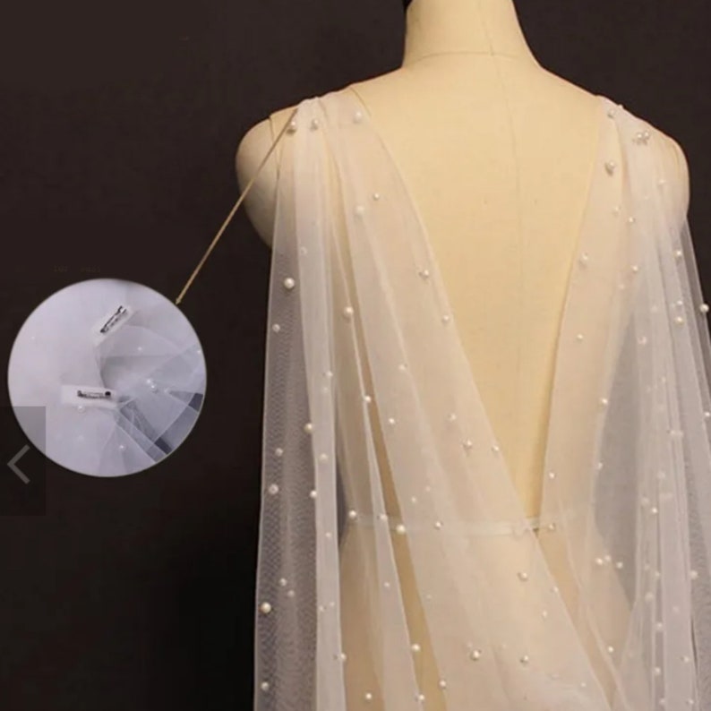 Beaded pearl bolero for wedding dress
Bridal lace bolero shoulder cover
Wedding gown overlay with pearls
Bridal bolero jacket for dresses
Elegant bridal shawl with beading
Lace wedding dress overlay accessory Wedding shoulder cover with pearls