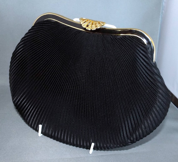 Black pleated satin evening bag with gold coloured