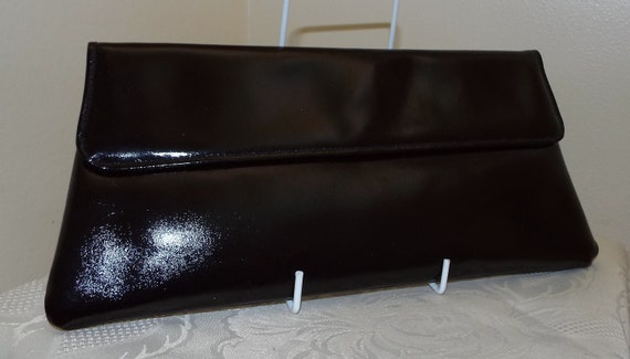 black patent leather clutch