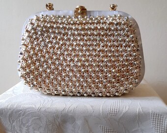 Vintage gold beaded rigid handbag with Mother of Pearl effect lucite frame and clasp