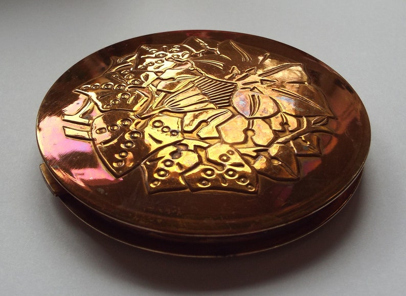 Pygmalion vintage art deco floral design large powder compact with an oil on water effect finish