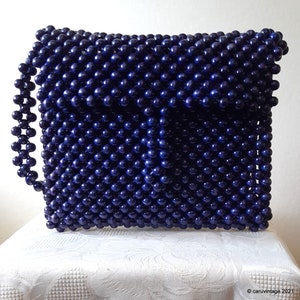 Bolso de mano con cuentas de palomitas de maíz azules