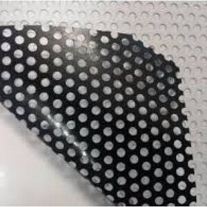 May include: A black vinyl sheet with a white dot pattern. The sheet is partially peeled back to reveal a white adhesive backing.
