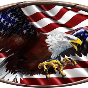 May include: A bald eagle with outstretched wings flies in front of a waving American flag. The flag and eagle are framed in a wooden oval with metal accents.