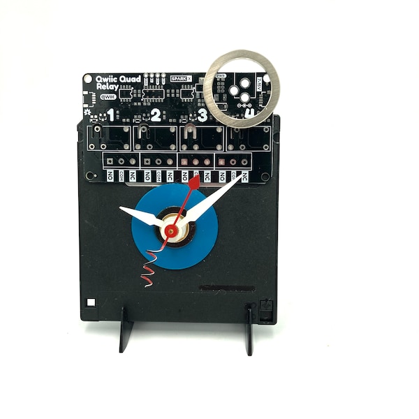 Floppy disk clock, with white and silver accented circuit board & disk spacer ring, wall or shelf display, AA battery, easel stand included