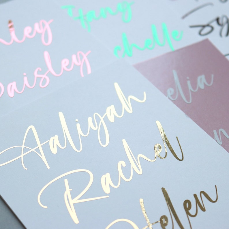 A set of colorful personalized calligraphy vinyl stickers