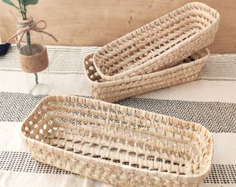 Woven palm leaf basket