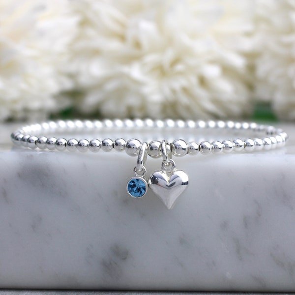 March birthstone bracelet. Sterling silver stretch bracelet with aquamarine charm. March birthstone gift.