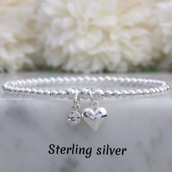 April birthstone bracelet. Sterling silver stretch bracelet with swarovski charm. April birthstone gift. Mothers day gift.