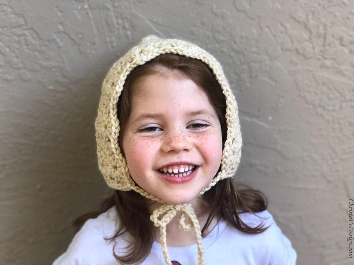 36 Crochet Baby Clothes Patterns with Bonnets, Booties, Rompers, and Dresses 1 Bella Bonnet Crochet Pattern: Bulky Yarn