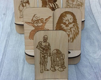 Unique Laser cut and engraved novelty various Star wars inspired Phone stands based on the viking stargazer chair