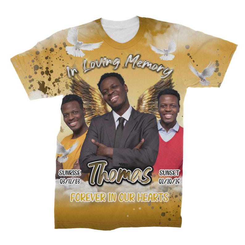 May include: A yellow and white t-shirt with a memorial design. The shirt features three men with angel wings and the text "In Loving Memory Thomas Forever In Our Hearts". The dates "Sunrise 03/11/83 Sunset 01/10/15" are also included.