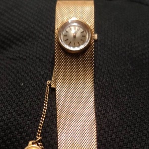 Omega oro antiguo store