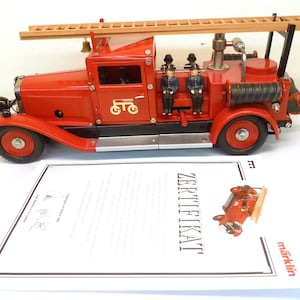 Magnificent exclusive fire truck MARKLIN large limited series engine rope new key box and certificates of collection lights 90s