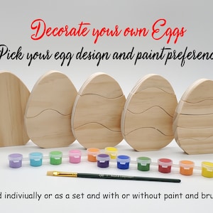 May include: Wooden egg shapes in various designs, ready to be decorated.  A set of paint pots and a paintbrush are included.  Decorate your own Eggs. Pick your egg design and paint preference. Sold individually or as a set and with or without paint and brush.