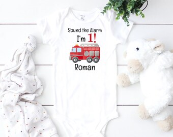 FIRE TRUCK 1st Birthday Boy Shirt, First Birthday Boys Baseball Raglan, Birthday Onesie® Firetruck Party, Personalized with Name and Number