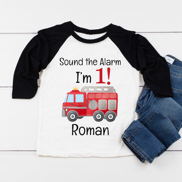 FIRE TRUCK 1st Birthday Boy Shirt, First Birthday Boys Baseball Raglan, Birthday Onesie® Firetruck Party, Personalized with Name and Number