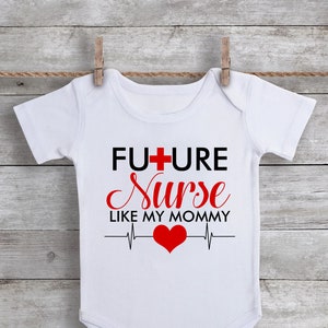 May include: White baby onesie with black text that reads "FUTURE NURSE LIKE MY MOMMY" with a red heart and a heartbeat graphic.