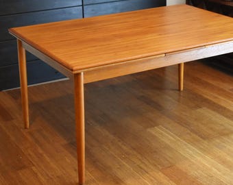 Extra-long restored Danish teak extendable rectangular dining table - (extends 59.5" - 106.5" long)