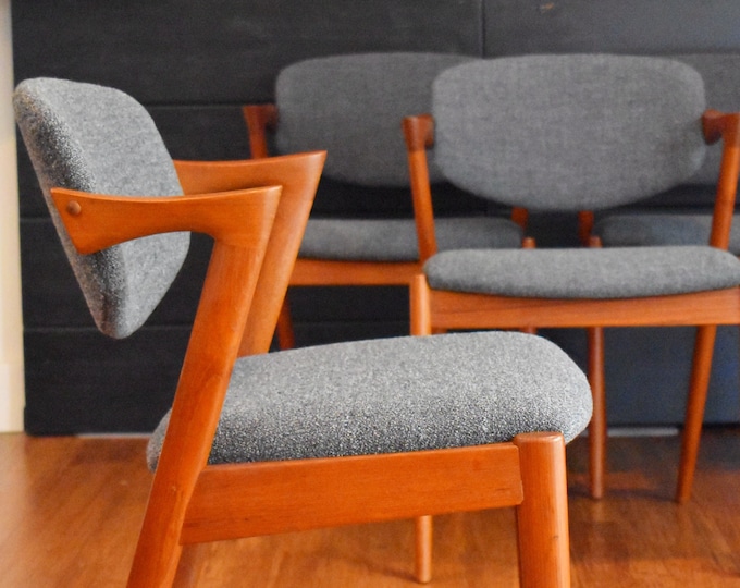 Four Danish modern teak Kai Kristiansen "Z" dining chairs w/new gray upholstery, model 42
