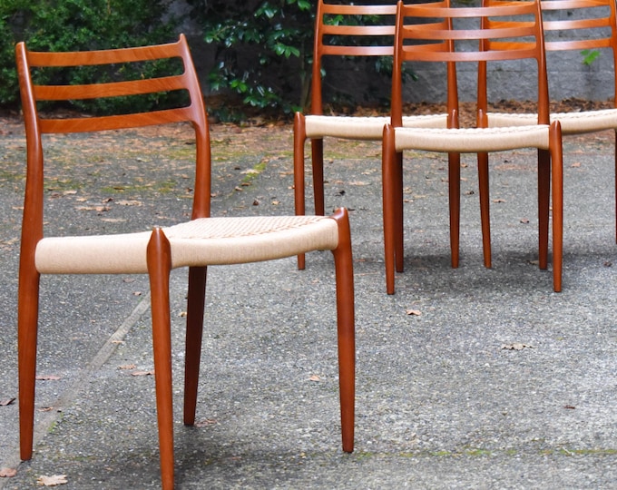 Four Danish teak Niels Moller 78 dining chairs w/new papercord seats