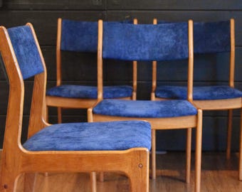 Four Danish teak dining chairs by Scandinavia Woodworks w/new blue upholstery