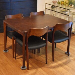 Restored expandable rectangular dining table (extends 47.5" - 83" long)