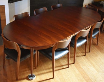 Extra-long restored Niels Moller Brazilian Rosewood dining set (round-to-oval expandable table, eight 71 chairs) - 105.75”
