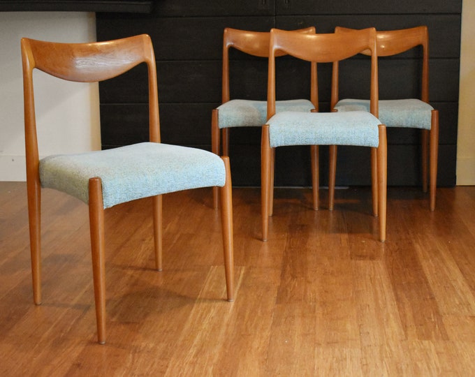 Four newly-restored teak "Bambi" dining chairs w/textured seafoam green upholstered seats, circa 1960s