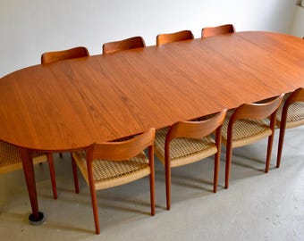 Extra-long 128.5" Danish teak extendable dining set (Henning Kjaernulf table, ten Moller 71 chairs)