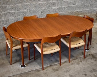 Restored Danish teak round-to-oval expandable table by Niels Moller (48.5" - 88.5")