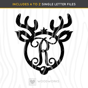 May include: Black and white silhouette of a reindeer head with antlers, a circle around the face, and the letter "A" inside the circle. The text "INCLUDES A TO Z SINGLE LETTER FILES" is at the top of the image. The text "WOODWORKS" is at the bottom of the image.