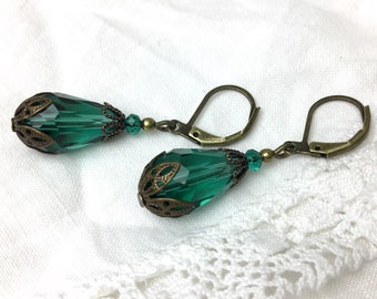 Green Czech glass faceted teardrop dangle antique brass earrings