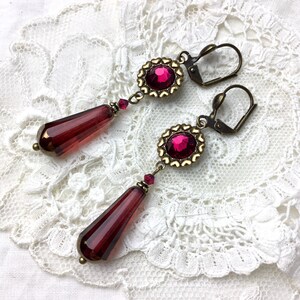 Ruby teardrop and cabochon dangle earrings antique brass red czech glass teardrop dangle earrings