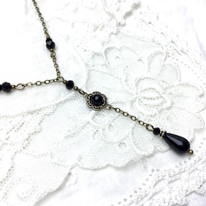 Black beaded antique brass lariat necklace lariat cabochon necklace