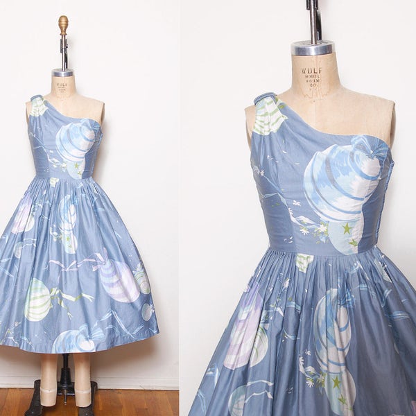 Vintage 50s blue novelty print dress / balloon print / asymmetrical fit and flare / pin up dress