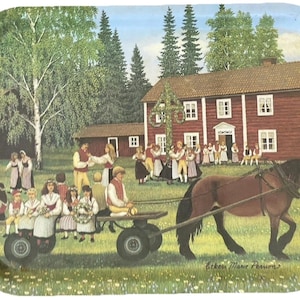 May include: Rectangular metal tray with a pastoral scene. A horse-drawn cart carries people in traditional clothing. A large red house and a maypole are in the background. The tray has a rounded edge and a glossy finish.