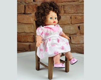 Baby doll in pink original dress. 1980s doll. A perfect gift for a baby girl. Doll with curls. Doll in pink shoes.