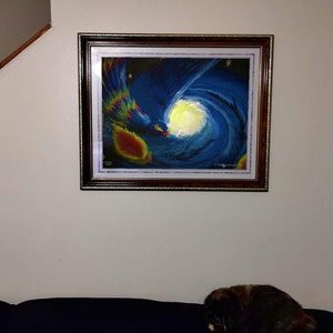 May include: A framed painting of a colorful abstract design with a blue and white swirl, a yellow sun, and a red and yellow flame. The painting is in a dark wood frame with a gold trim.