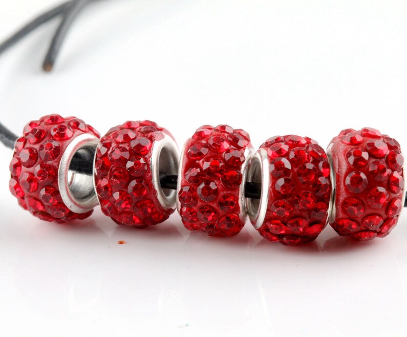 A silver rhinestone charm beads letter O fit European snake chain