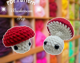 May include: PDF pattern for crocheting a mushroom pop. The image shows two crocheted mushrooms, one with the top open and one with the top closed. The mushrooms are red and white.