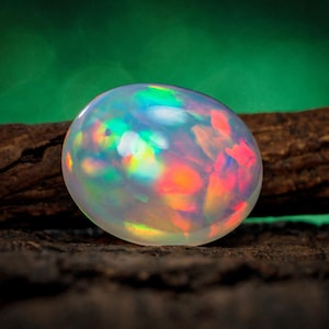 Natural Ethiopian Opal Cabochon: Oval White Gemstone, 3.70 Carat (12X10X6 MM)