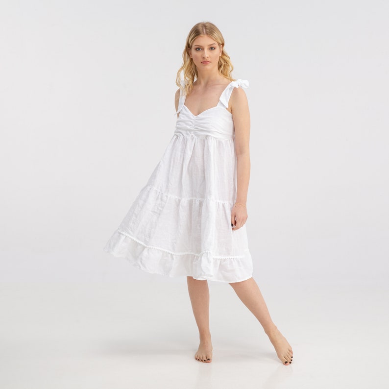 white linen ruffle dress