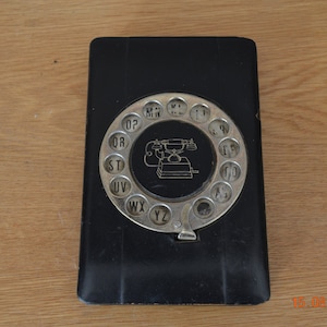 Vintage telephone directory and perpetual calendar