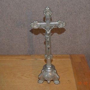 Silver metal crucifix image 1